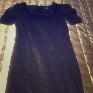 Dress with embellished neckline